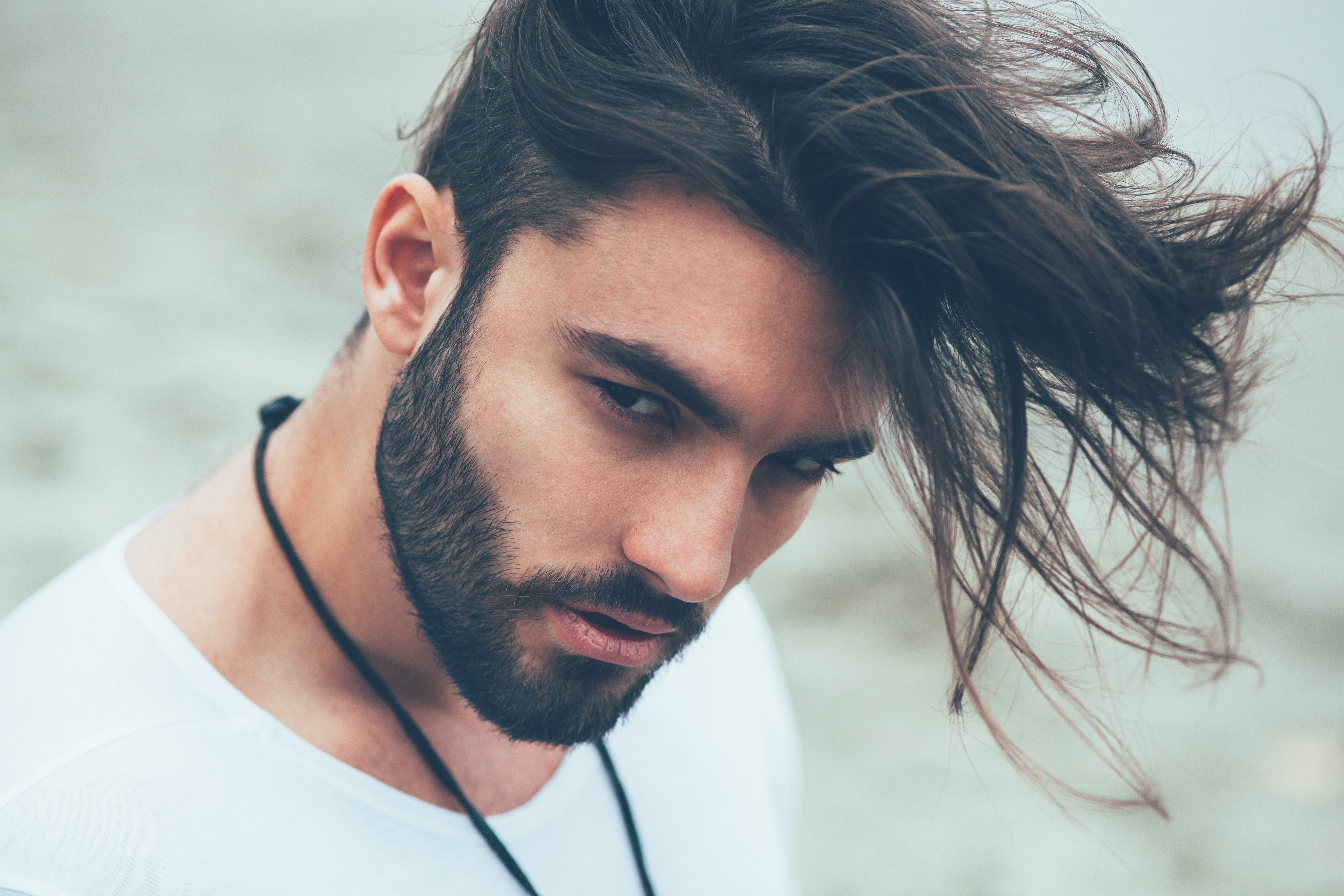 Man With Beard And Modern Hairstyle